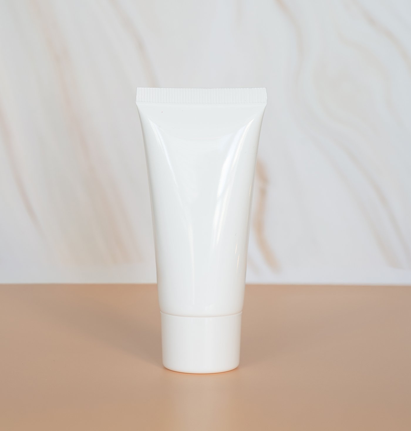 white cosmetic tube -product photography