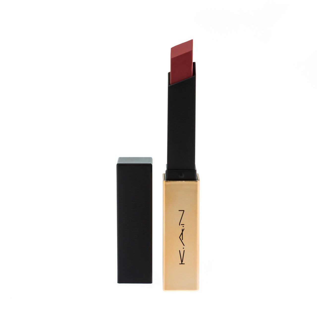 Product photography of a luxury deep red lipstick
