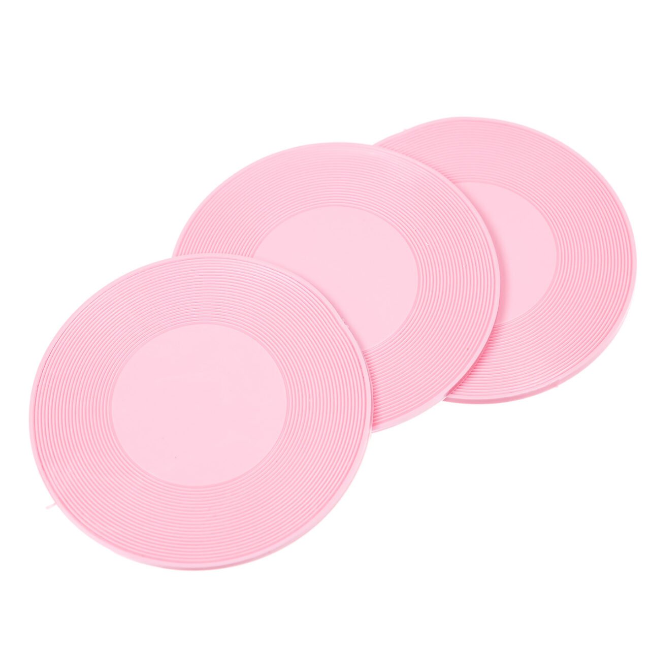 Three pink silicone coasters for hot and cold drinks, modern table accessories, Sun Cook product image.
